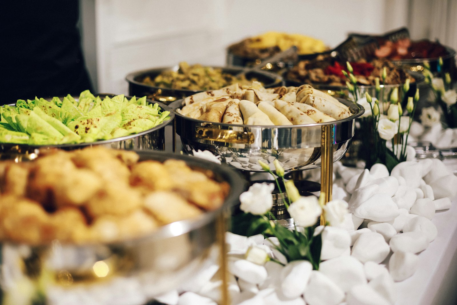 Catering buffet with chafing dishes at an event