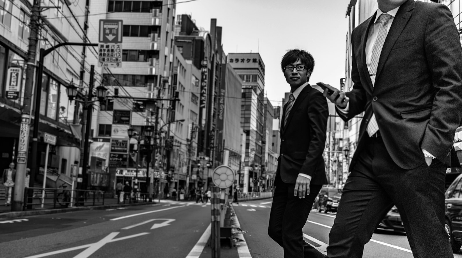Business professionals walking through a Tokyo street